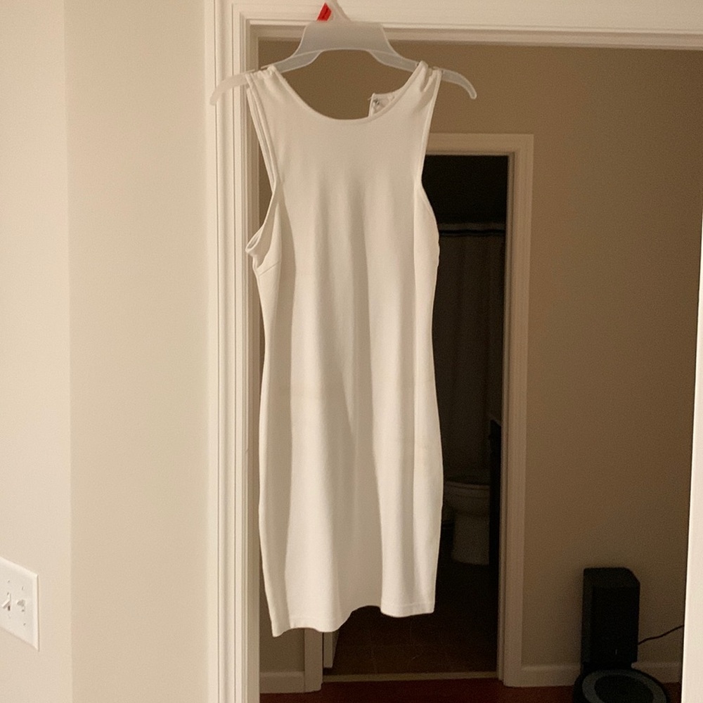 White bandage dress. Size- L  tight, rayon &spandex. Perfect for bach events